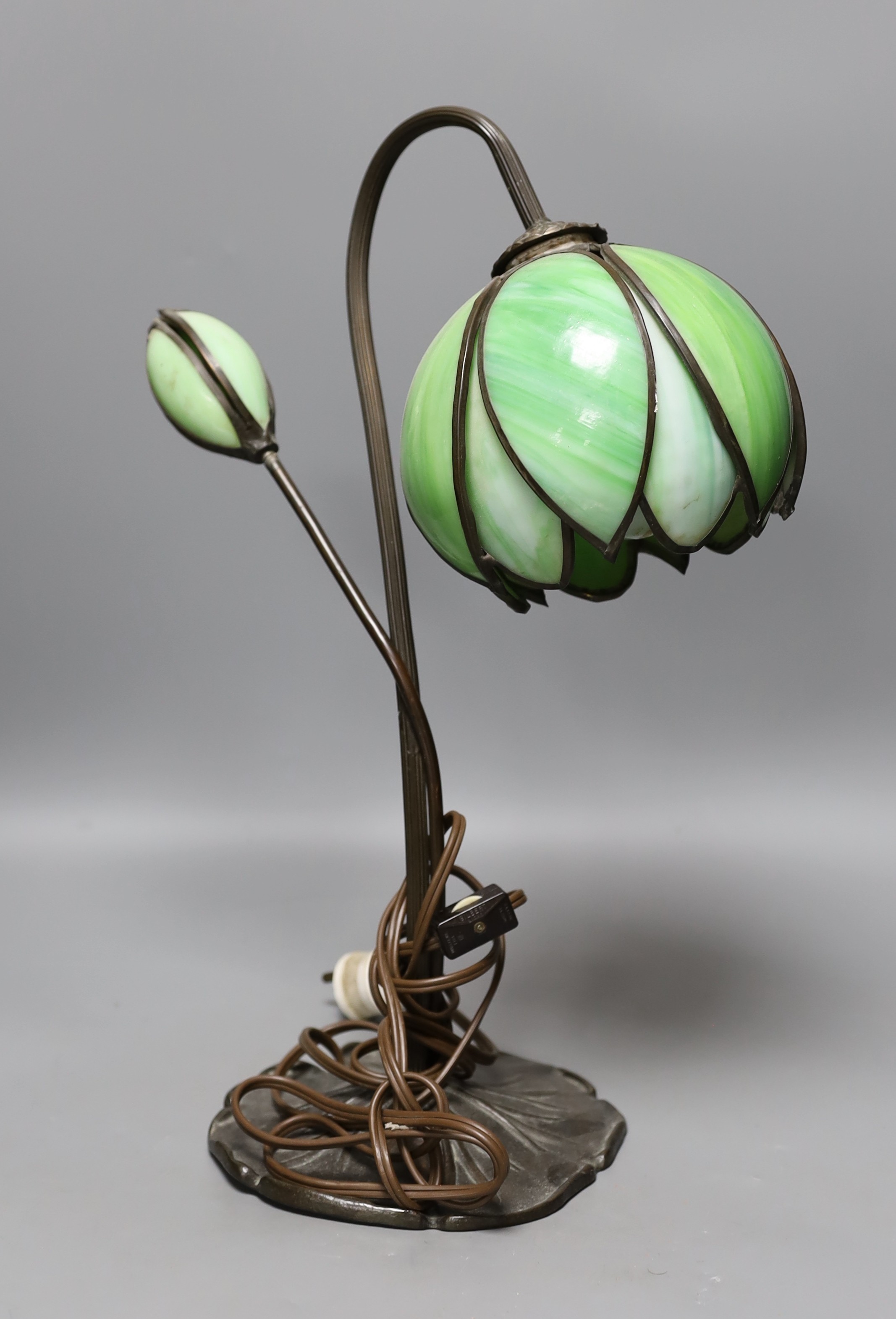 A green glass and metal, Tiffany style tulip lamp, 42cm high